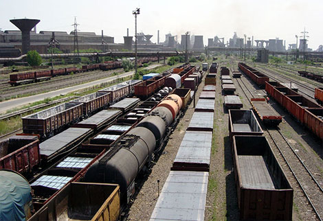 Classification yard with freight cars waiting to be sorted and depart for new destination